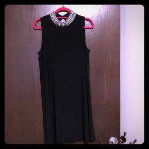 Gorgeous little black dress!!! With a bling collar